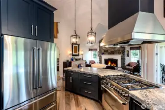 Gas range with island hood vent allowing you to keep your open concept.