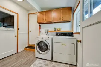 Separate laundry room off of the garage.