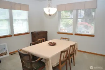 Dining room right off the entrance could be walled in to create a den or office.