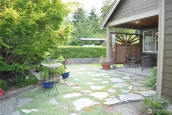 No grass to mow back here! It's all wooly thyme between the pavers.