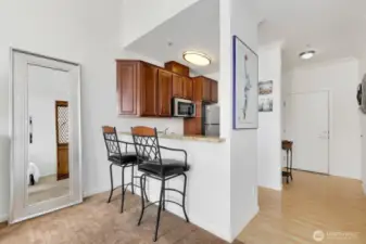 Kitchen features breakfast bar.