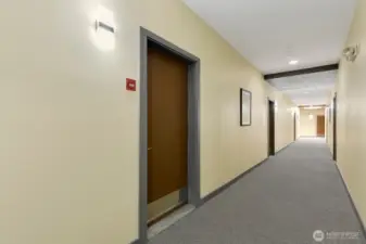 Interior hall and entrance to unit.