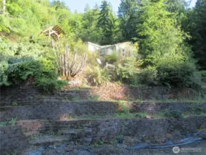 Perched above terraced rockery