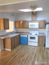 Roomy kitchen.  New sink, dishwasher and microwave,