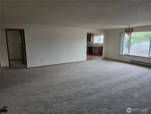 From front door looking towards kitchen.