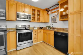 Beautiful Cook's Kitchen Shows Stainless Steel Appliances, Granite Counters & Exceptionally Attractive Shaker Style Cabinetry