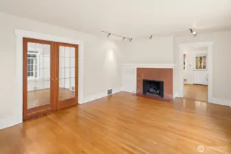 French doors lead into a bedroom or den .