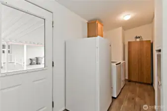 Door from covered carport into utility room