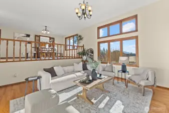 Formal living room backs up to the formal dining room, just one level above.