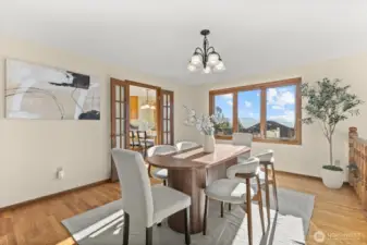 Formal dining room conveniently located off of the kitchen, entertaining is a breeze with this thoughtful design.