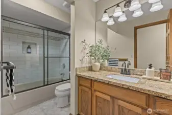 Full-size hall bath is roomy and has great light!