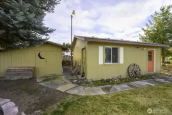 So much storage and work space. Buildings have electricity...He Shed and a She Shed!