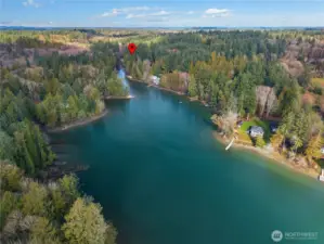 Rare opportunity to own a private waterfront on the Sound in the highly desirable Gravelly Beach neighborhood, tucked within a peaceful cove.