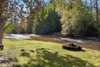 Lovely green grassy area to relax or entertain. Enjoy evening bonfires by the beach.
