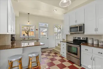 Great open kitchen space with high ceilings and natural light.
