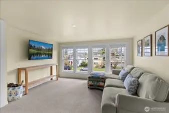 Light filled landing at the top of the stairs.