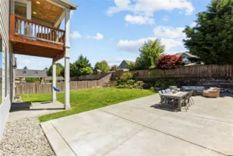 Immaculate backyard located on hard-to-find 1/4 acre lot with brand new extended patio ready for summer entertaining. Garden area on the hill includes raspberries, strawberries, and blackberries.