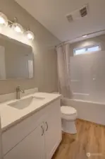 Full bathroom with tub/shower combination