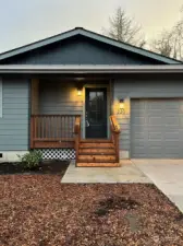 Front of home with parking pad