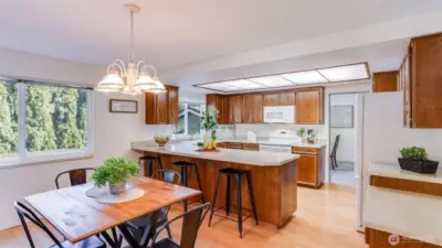 Kitchen is thoughtfully placed between both dining space, allowing endless dining and entertaining options.