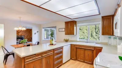 The spacious and open kitchen is just steps from the formal dining room, ideal for easy serving.