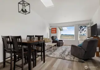 Upon entering your eyes go strait to the view and the Southern facing Deck.  Very light and bright.  Nicely placed skylight.