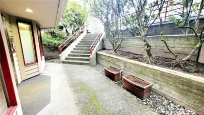 Exterior landing next to main entry.