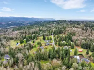Aerial view of the property and surrounding area.