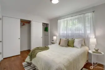 Primary bedroom has two closets! And it's own door to the bathroom.