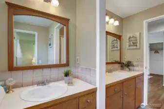 Another view, with the toilet and door behind you, and the door to the main hallway at the far end. Great spaces! Everyone can have their own drawer in the bathroom :)