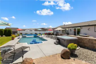 Back of home with huge entertaining patio.