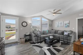 Family room with new flooring throughout.
