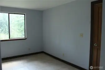 Primary bedroom at back of home