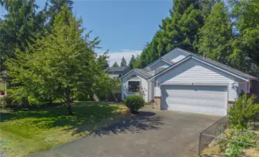 This home is tucked quietly back from the road.  Ample driveway and off road parking