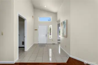 Looking back toward the entry, laundry room and garage access on the left.