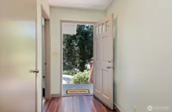 Welcome to the main part of your home. Flex room is located through the open door to your left. Behind you is the hallway to the garage, the 2nd Primary & the Kitchen.