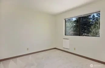 Flex Room off the Main Entry as you enter the home. Great Guest Room or Office. New carpet and eco-electric wall heat.