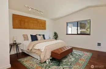 Primary Bedroom that looks out upon your private backyard.