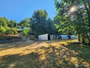 view toward other greenhouses & storage