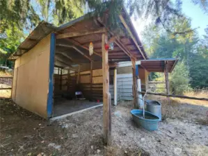 small hay barns, one with tack room