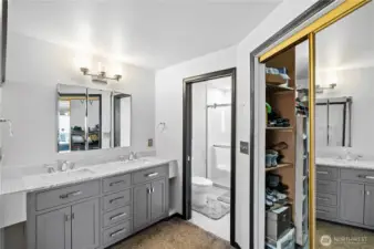 Primary ensuite and walk-in closet on the right
