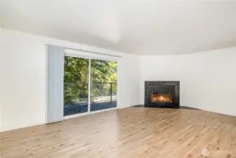 This multi-level gem welcomes you with a cozy fireplace in the living room, a delightful dining area with new flooring throughout.