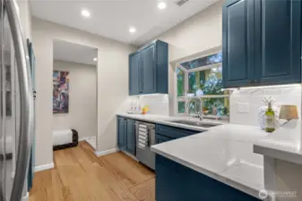 New Quartz countertops, lots of space for meal prep.