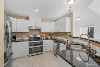 Kitchen equipped with a new $3k fridge and $2,500 oven