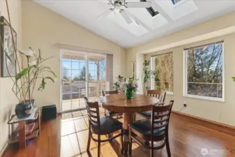 Vaulted ceilings, skylights & large windows keep this home light & bright.