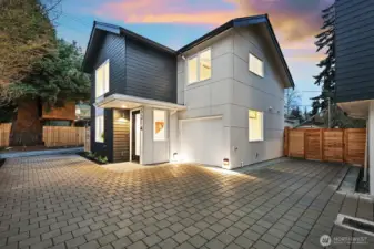 Stunning new construction 2-story home with attached 1-car garage.