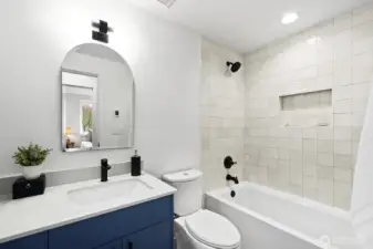 Full shared bathroom upstairs.