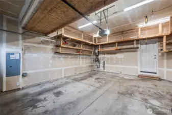 2 car garage with shelving