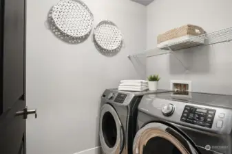 Convenient laundry on the upper level. Washer and dryer stay
