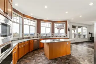 Entering the kitchen you notice all the windows and the view to the water.